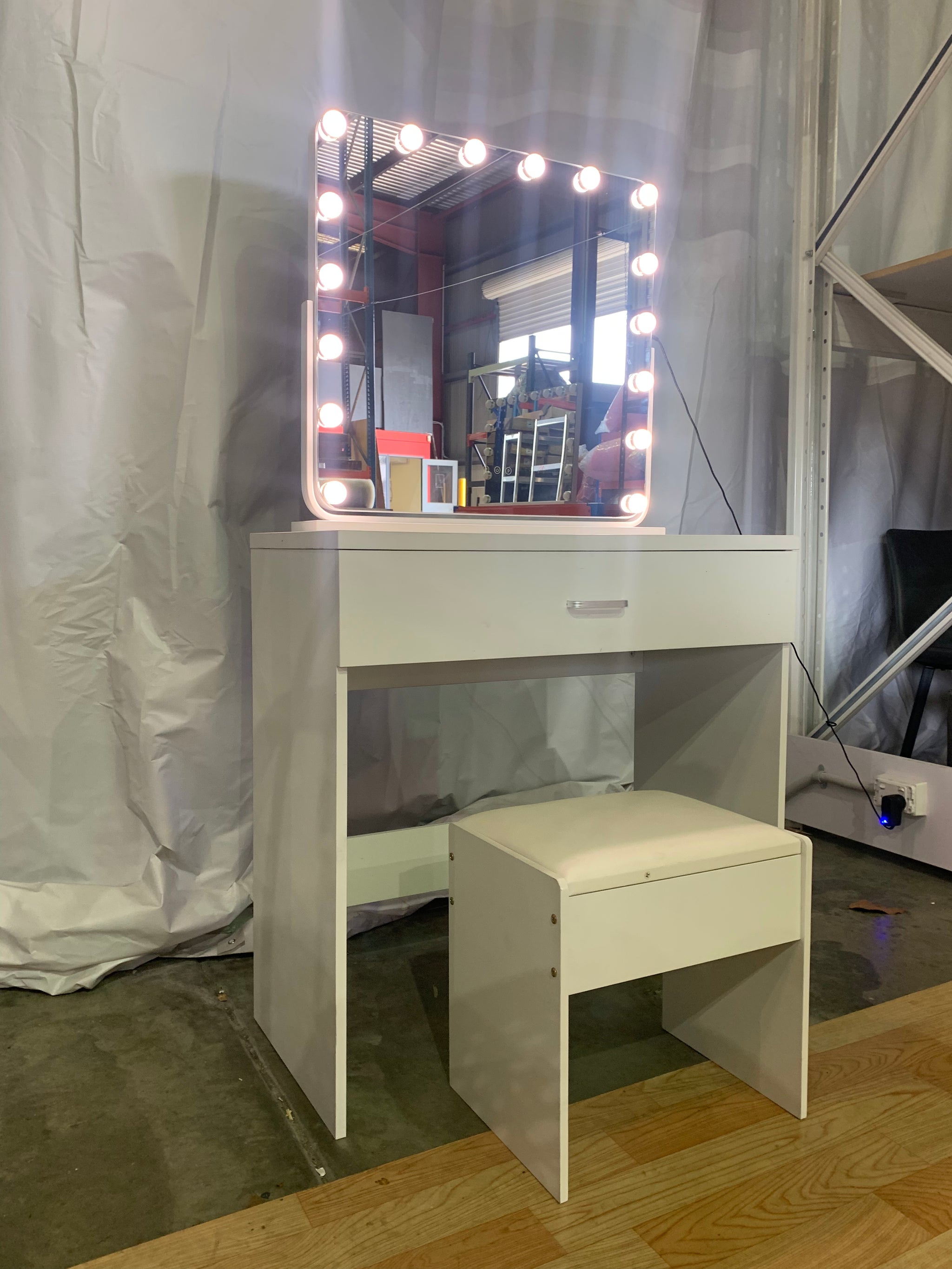 Small dresser with mirror and outlet chair