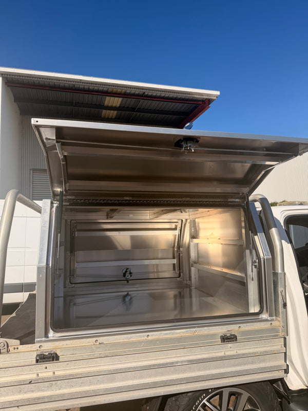 Silver canopy with the door open on gas struts