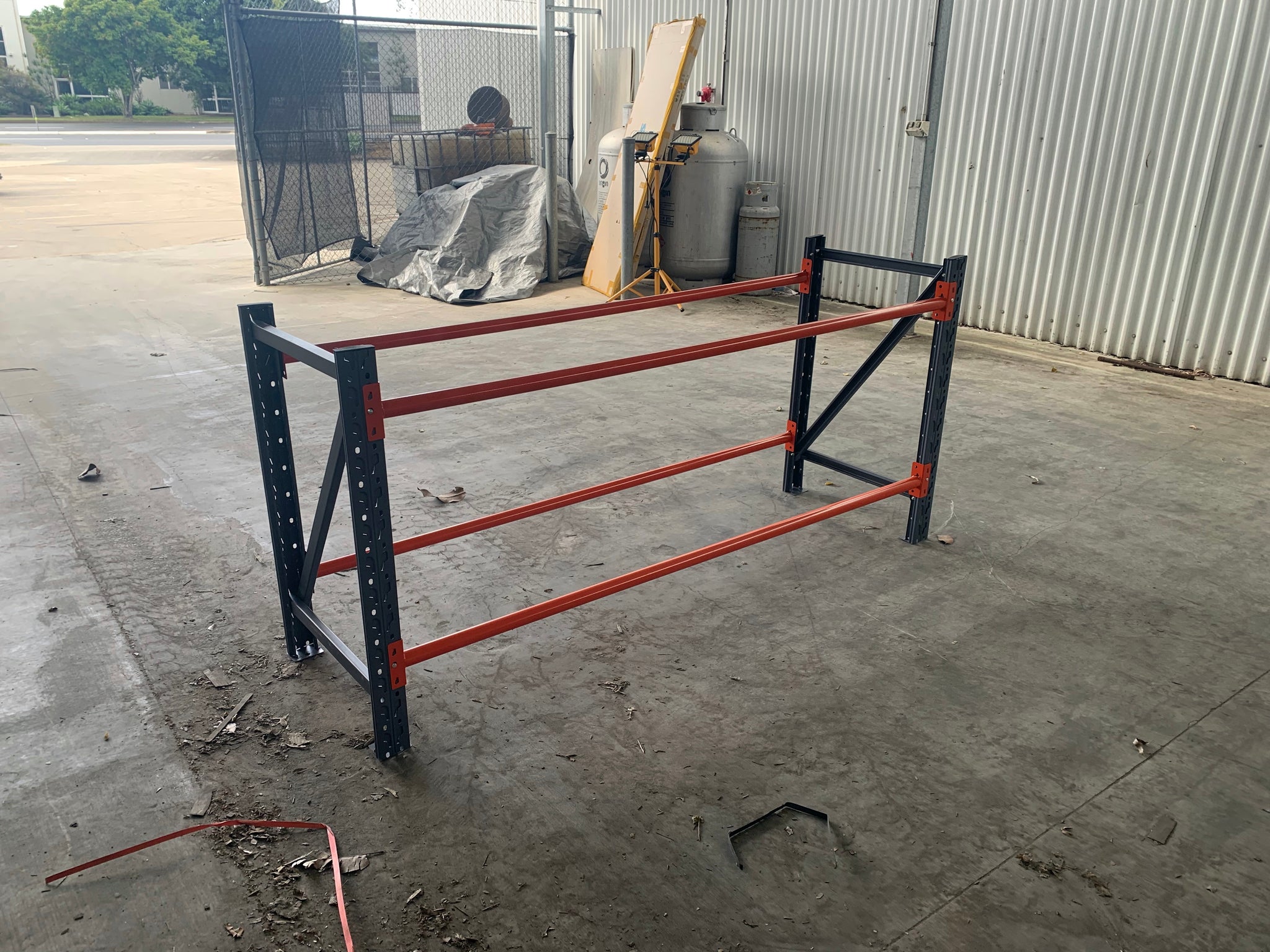 Charcoal and Orange 500kg 2 Tier Tyre Rack Installation and Delivery Package. 500kg/ 14tyres Max