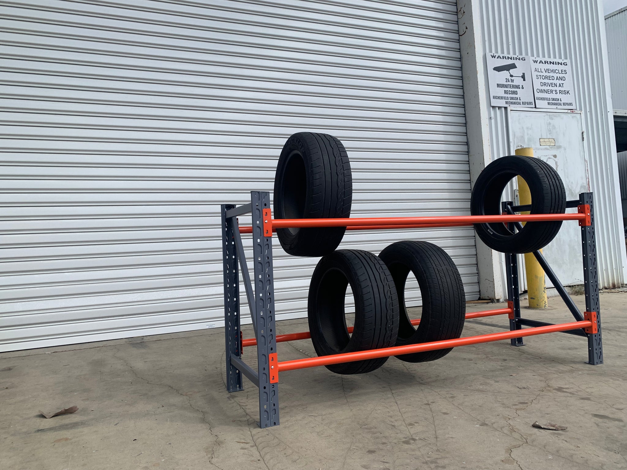 Charcoal and Orange 500kg 2 Tier Tyre Rack Installation and Delivery Package. 500kg/ 14tyres Max